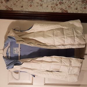 Old Navy white vest. Powder blue lining.